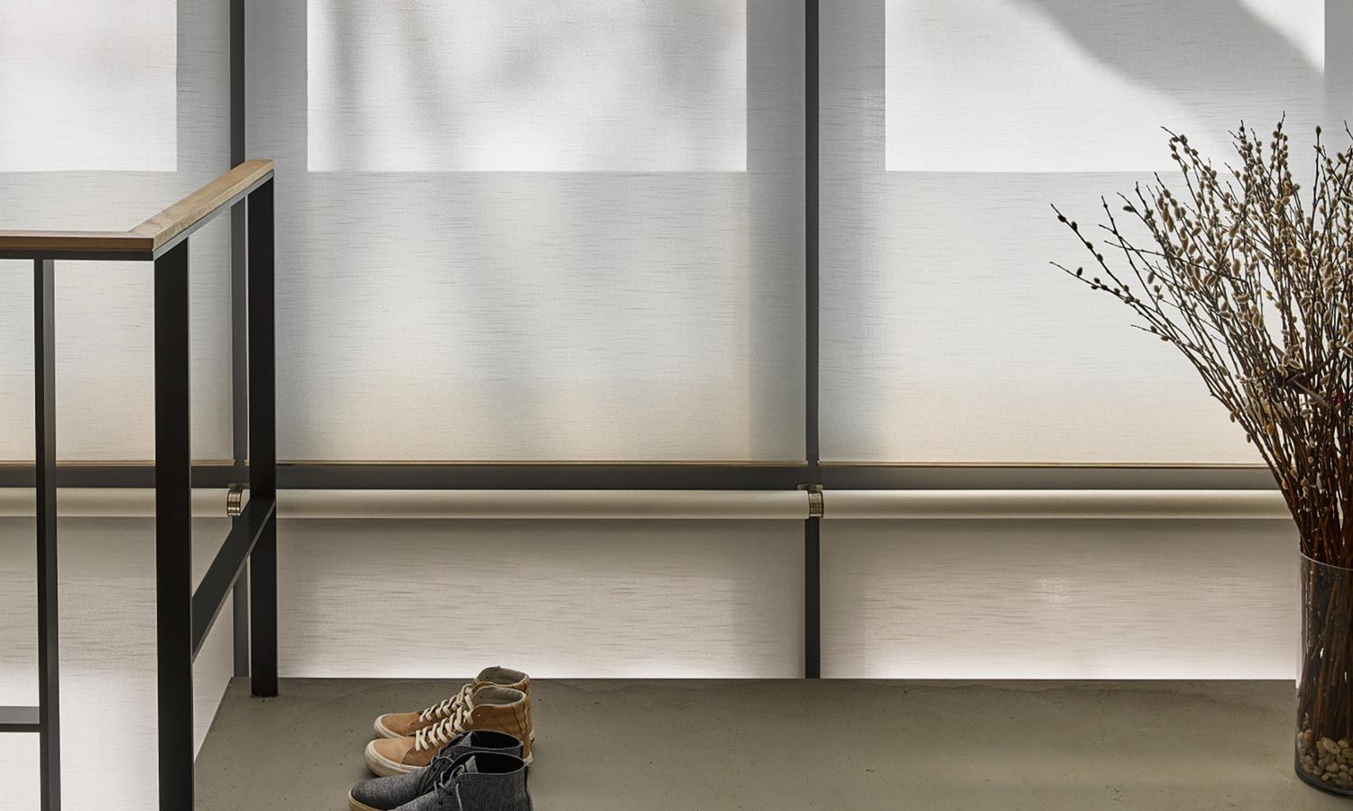 Lutron Palladiom Shades in a living room with neutral colors