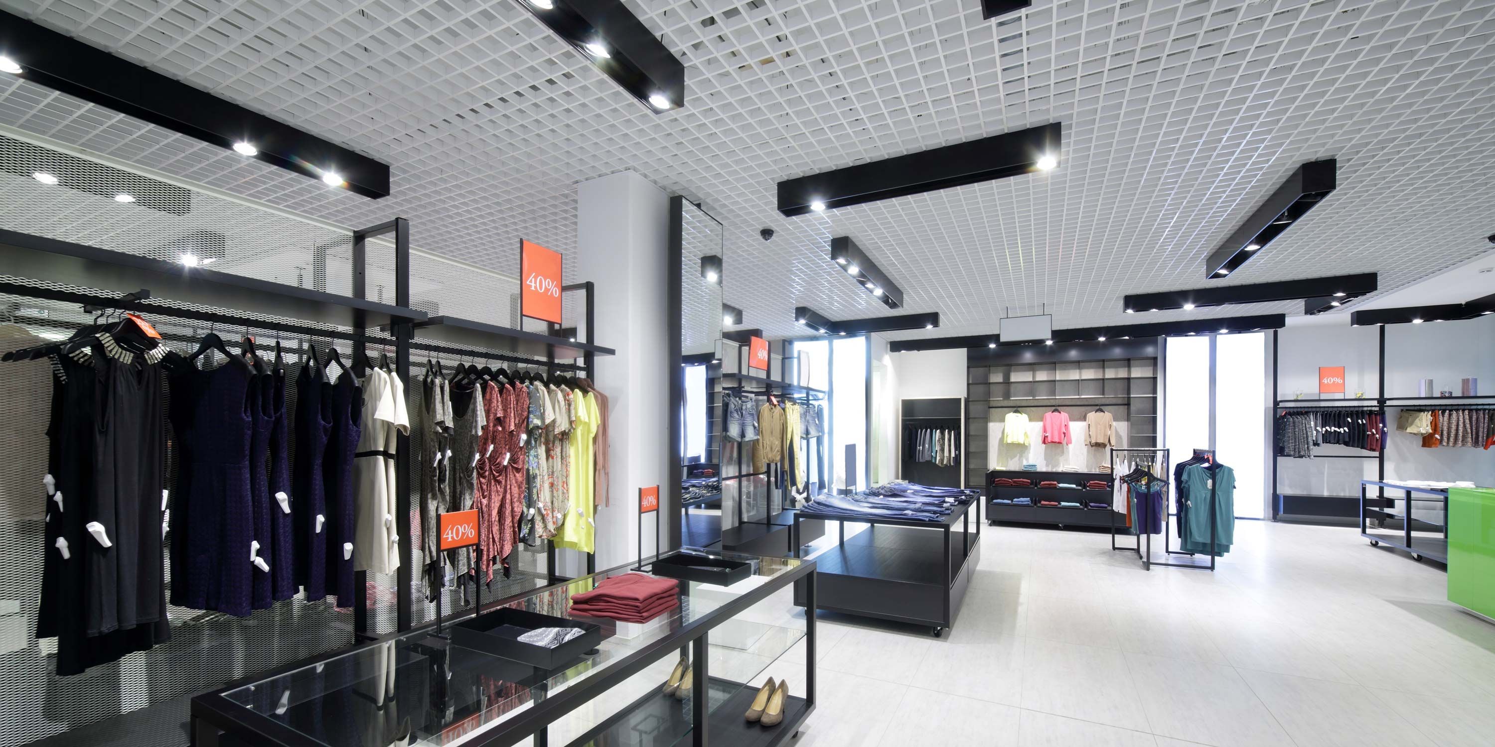 retail space with clothing and LED lighting on the ceiling