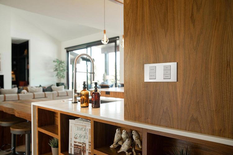 Control4 keypad on a wood wall