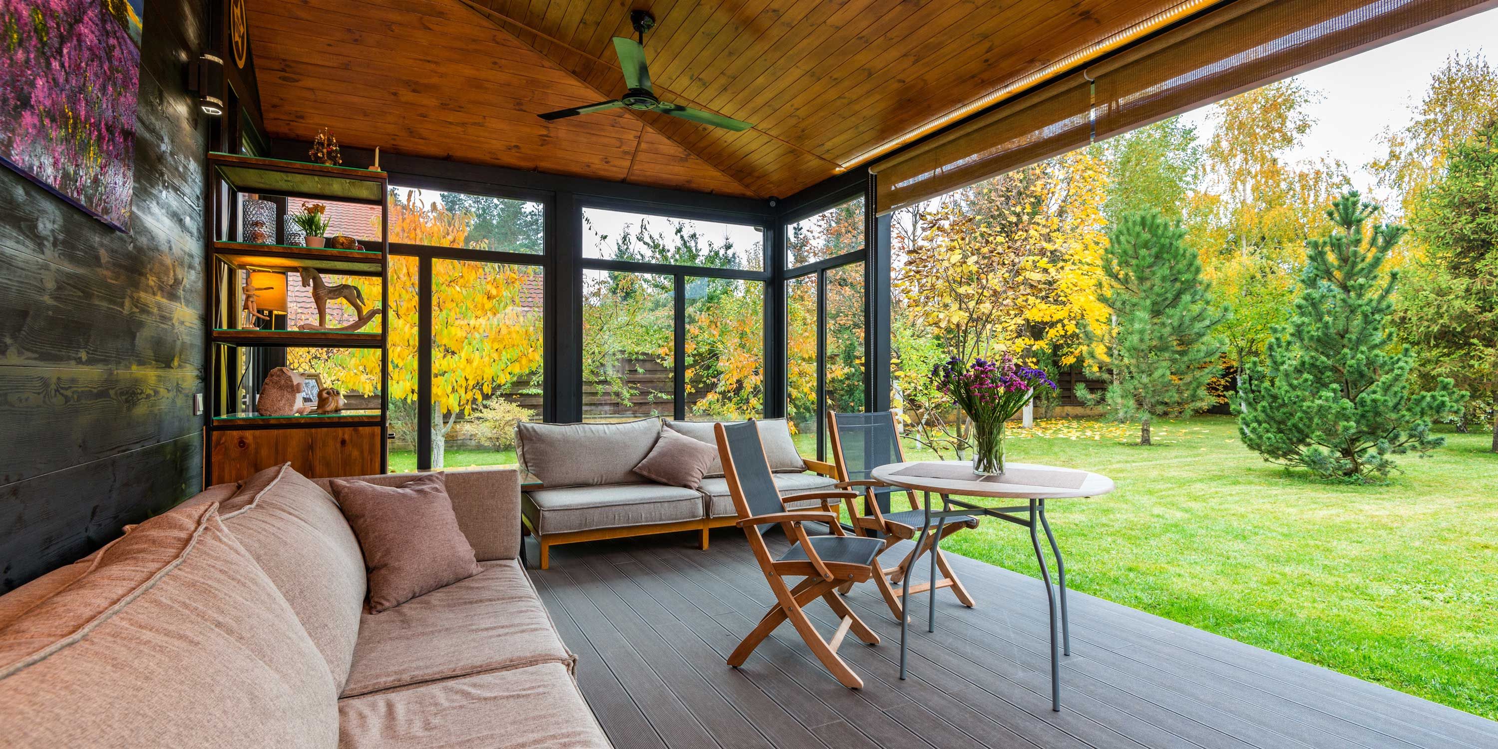 covered patio in a green yard